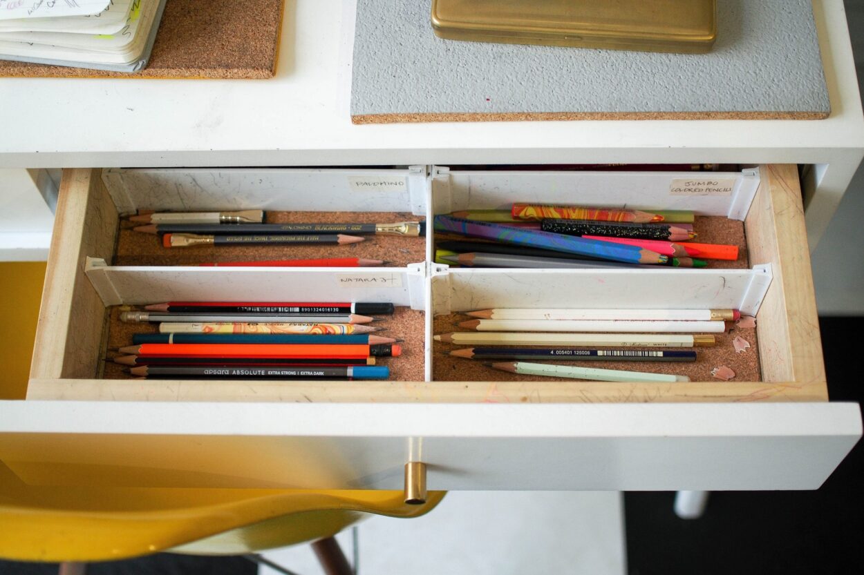 organized pencils in a desk drawer