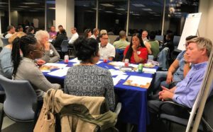 Co-Creating Communities- an evening of dialogue table of people