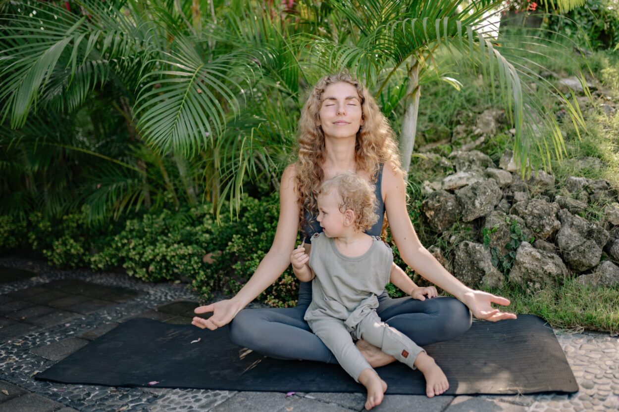 Parent with child meditating in time of stress