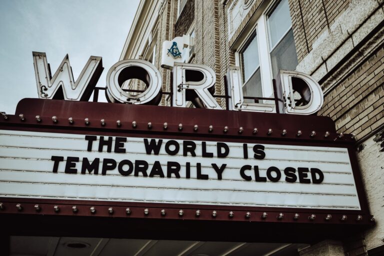 marquee that says the world is temporarily closed