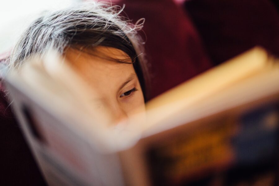 child happily reading