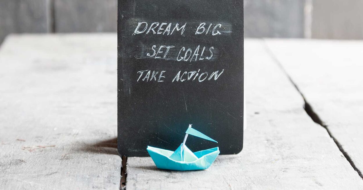 To-do list, and an origami boat. "Dream Big. Set Goals. Take Action."