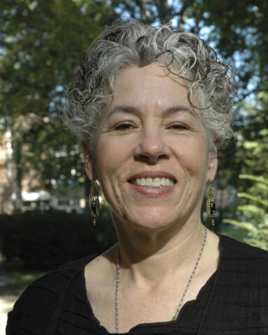 A photo of a woman with short gray hair.