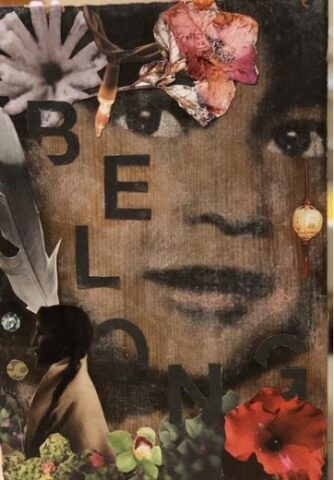A piece of collage art, with a child's face, flowers, and the word "belong"