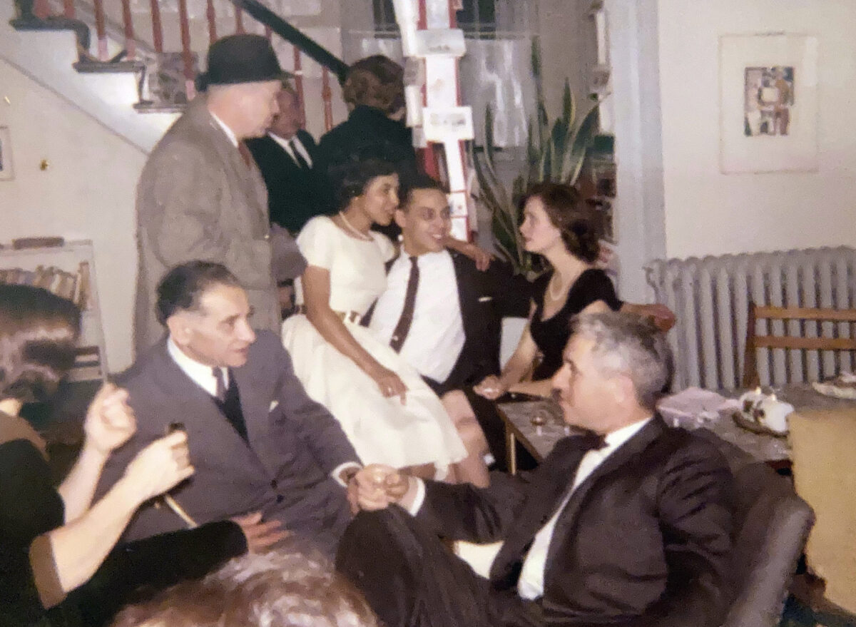 A photograph of Johnson’s parents (pictured, center) at a party.