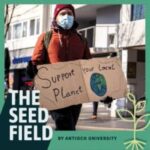 Seed field cover photo; individual holding a "support your local planet" sign