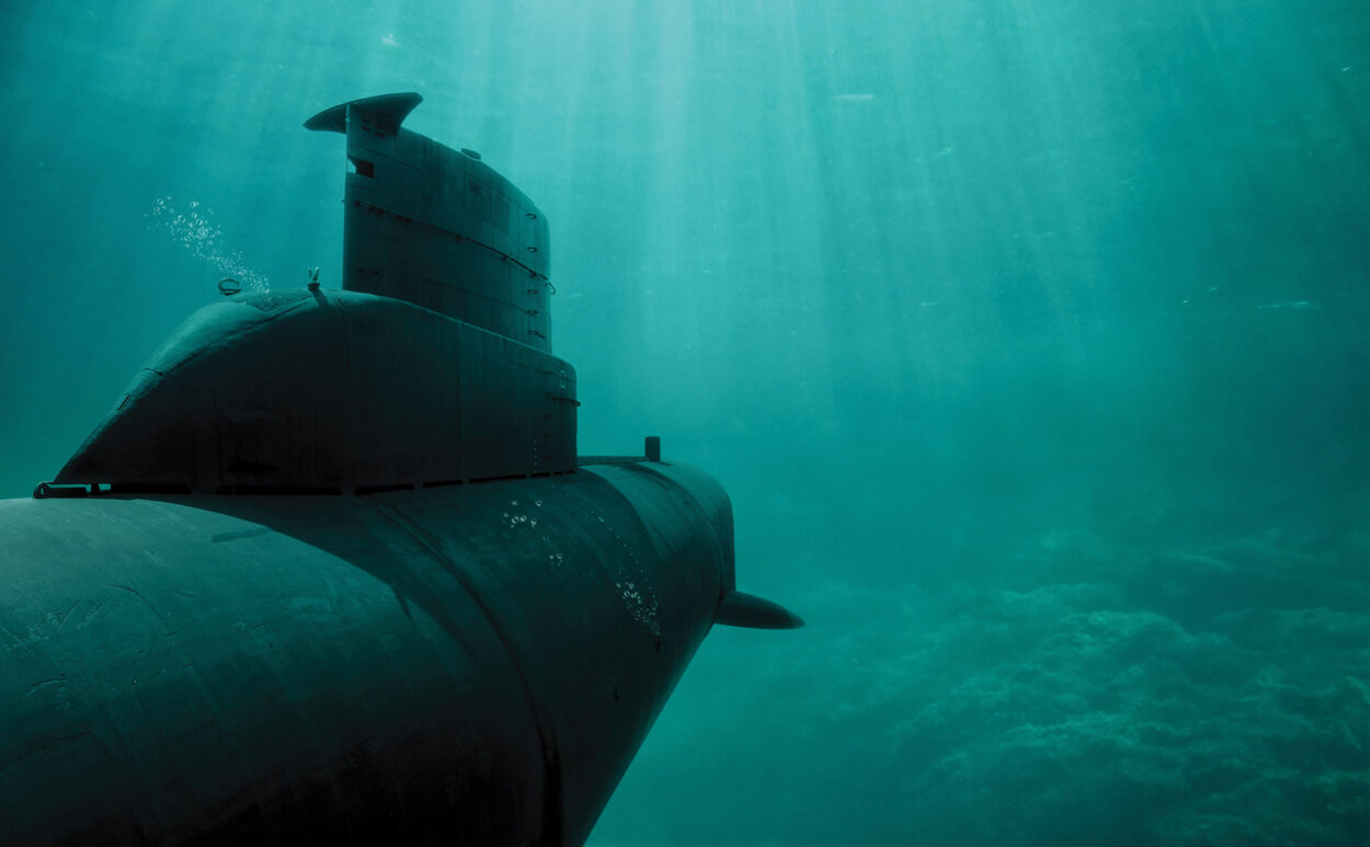 Blue water with submarine