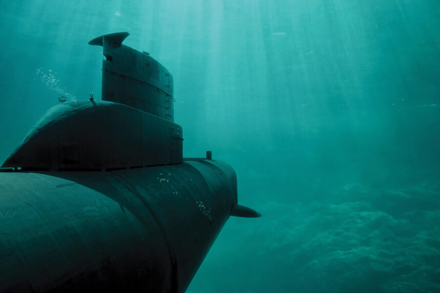 Blue water with submarine