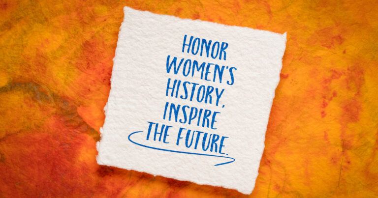 Paper on orange background that says, Honor Women's History. Inspire the future.