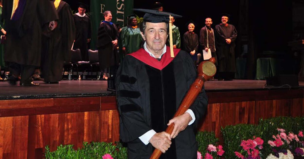 Portrait of Al Erdynast at a commencement ceremony in full regalia.