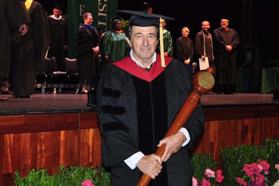 Portrait of Al Erdynast at a commencement ceremony in full regalia.