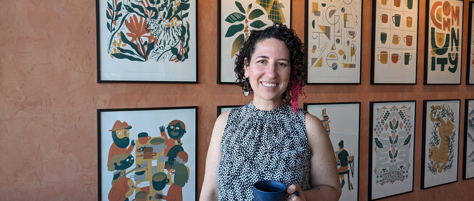 Becky Elias holding a coffee mug