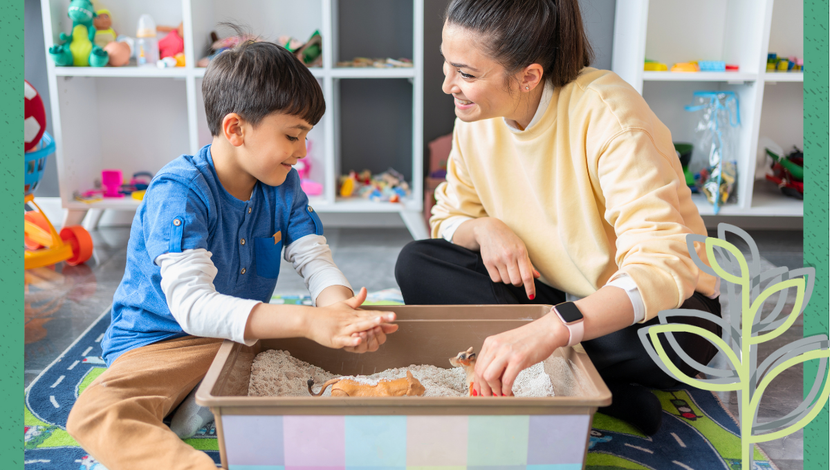 A therapist and child working using sandbox play.