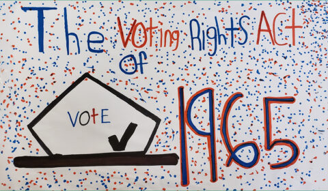 Student created sign that says, The Voting Rights Act of 1965, Vote with a checkmark.
