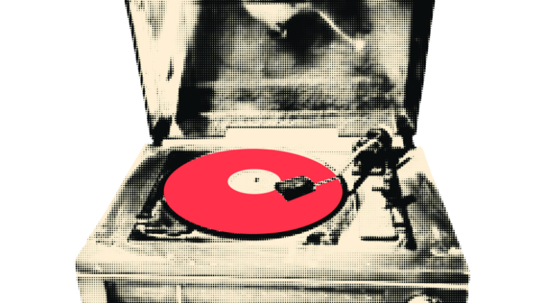 A vintage turntable playing a red vinyl record with the needle on the groove.