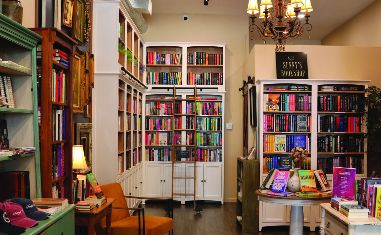 Sunny's Bookshop, bookstore, books, green, wood floor, shop